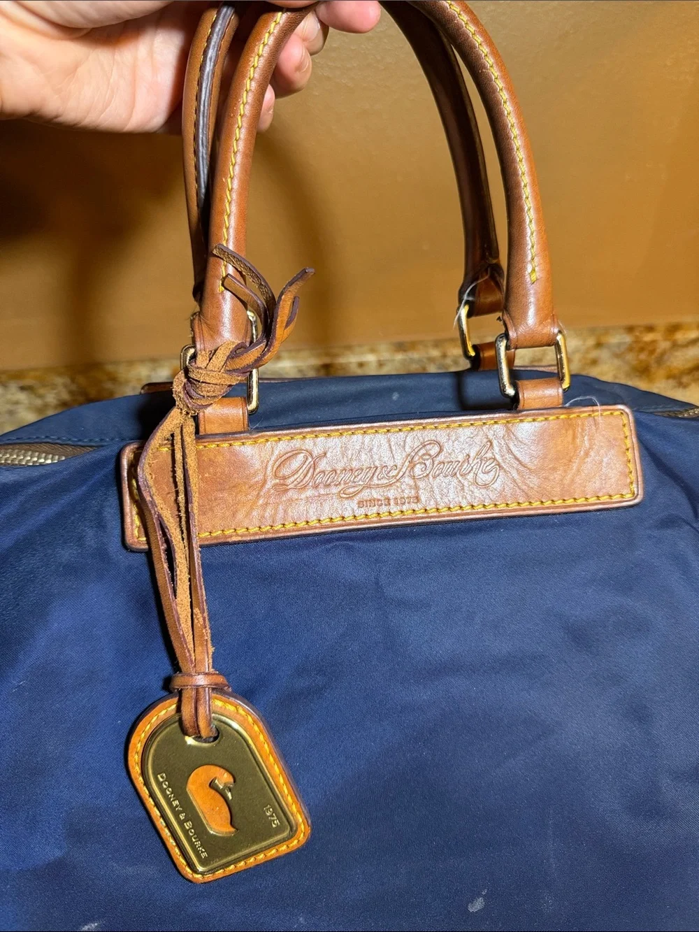 Dooney & Bourke Navy Nylon Messenger Bag with Tan Leather Trim